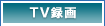 TV^